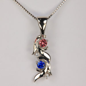 White gold and diamond vine birthstone pendant