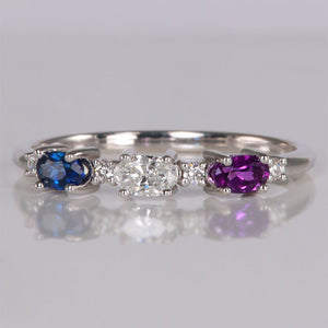 east west three stone mother's birthstone ring